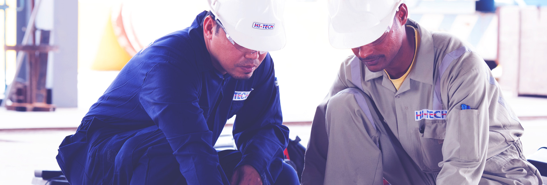 Hi-Tech inspectors performing close NDT inspection